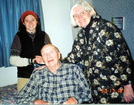 Sara, Kathy visiting Great (Great) Uncle Clem at Xmas 2003